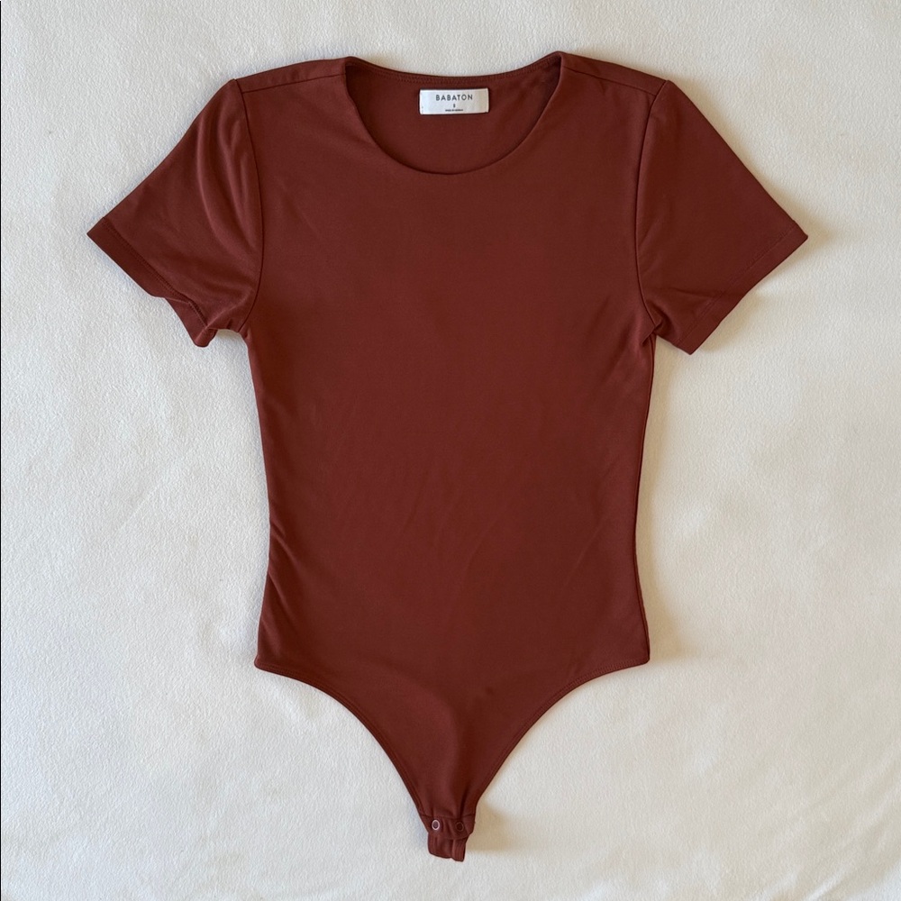 ARITZIA Babaton Contour Crew Shortsleeve Bodysuit in Rush copper color